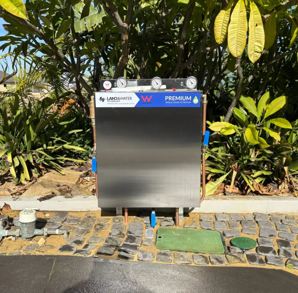 Land & Water premium 3-stage rainwater filter system in a garden